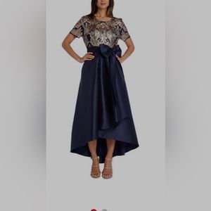 Women’s size 16 gown high in the front lower in the back